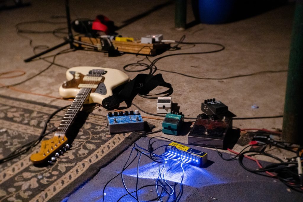 Guitar laying on floor